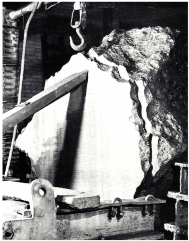 The 20 ton Agpalilik mass of the Cape York meteorite was sectioned in October 1970 using a wire saw fed through a carborundum water slurry.